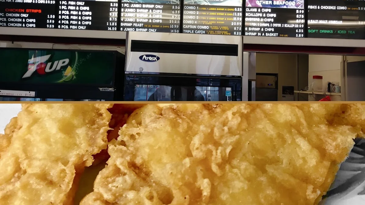 Crispy fried seafood beside thick-cut chips.